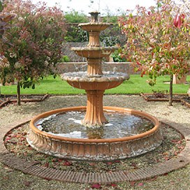 The terracotta fountain - click to link to visit the web page about the gardens