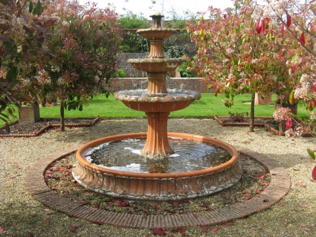 A tiered terracotta fountain in the Terracotta Garden